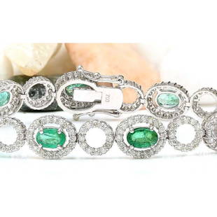 6.98 CTW Natural Emerald 18K Solid White Gold Diamond Bracelet: 6.98 CTW Natural Emerald 18K Solid White Gold Diamond Bracelet Manufacturer's Suggested Retail Price: $ 8900.00 6.98 Carat Natural Emerald 18K Solid White Gold Diamond Bracelet Item Type: