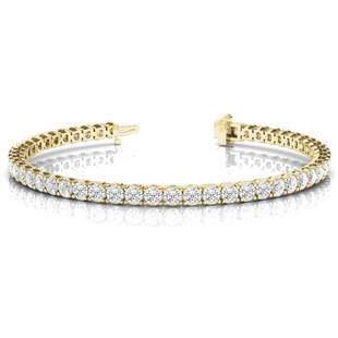 Natural 14.8 CTW Diamond Bracelet 18K Yellow Gold: Natural 14.8 CTW Diamond Bracelet 18K Yellow Gold Manufacturer's Suggested Retail Price: $75200.00 Product Type: Diamond Bracelet Stone1 Type: 37 Diamonds @ 14.8 CTW Stone1 Color: G Stone1 Clarity: