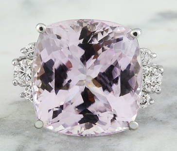 23.75 CTW Kunzite 14K White Gold Diamond Ring: 23.75 CTW Kunzite 14K White Gold Diamond Ring Manufacturer's Suggested Retail Price: $ 6700.00 Stamped: 14K Total Ring Weight: 11.8 Grams Kunzite Weight 23.00 Carat (17.35x16.60 Millimeters)