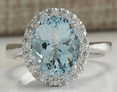3.79 CTW Natural Aquamarine And Diamond Ring In 14K Solid White Gold: 3.79 CTW Natural Aquamarine And Diamond Ring In 14K Solid White Gold Manufacturer's Suggested Retail Price: $ 3200.00 Stamped: 14K Ring Size: 6.75 Total Ring Weight: 4.5 Grams Diamond