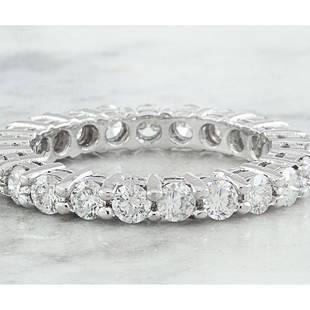 2.00 CTW Diamond 18K White Gold Eternity Ring Band: 2.00 CTW Diamond 18K White Gold Eternity Ring Band Manufacturer's Suggested Retail Price: $ 5300.00 Stamped: 18K Total Ring Weight: 3.5 Grams Diamond Weight: 2.00 carat (F-G Color, VS2-SI1