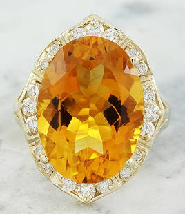 12.20 CTW Citrine 18K Yellow Gold Diamond Ring: 12.20 CTW Citrine 18K Yellow Gold Diamond Ring Manufacturer's Suggested Retail Price: $ 3800.00 Stamped: 18K Total Ring Weight: 6 Grams Citrine Weight 11.60 Carat (18.00x13.00 Millimeters)