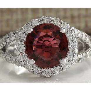 4.35 CTW Natural Pink Tourmaline And Diamond Ring 18K Solid White Gold: 4.35 CTW Natural Pink Tourmaline And Diamond Ring 18K Solid White Gold Manufacturer's Suggested Retail Price: $ 4800.00 Stamped: 18K Ring Size: 6 Total Ring Weight: 7.5 Grams Diamond Weight: