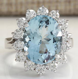 6.96 CTW Natural Aquamarine And Diamond Ring In 18K Solid White Gold: 6.96 CTW Natural Aquamarine And Diamond Ring In 18K Solid White Gold Manufacturer's Suggested Retail Price: $ 5300.00 Stamped: 18K Ring Size: 6.25 Total Ring Weight: 6.3 Grams Diamond