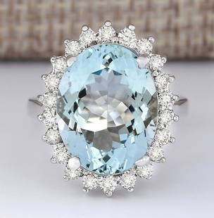 9.12 CTW Natural Aquamarine And Diamond Ring In 14k White Gold: 9.12 CTW Natural Aquamarine And Diamond Ring In 14k White Gold Manufacturer's Suggested Retail Price: $ 4400.00 Stamped: 14K Ring Size: 6.5 Total Ring Weight: 6 Grams Diamond Weight: 