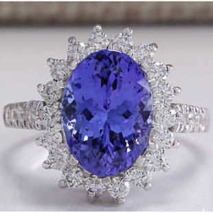 3.31 CTW Natural Blue Tanzanite And Diamond Ring In 14K White Gold: 3.31 CTW Natural Blue Tanzanite And Diamond Ring In 14K White Gold Manufacturer's Suggested Retail Price: $ 4700.00 Stamped: 14K Ring Size: 6.25 Total Ring Weight: 5 Grams Diamond Weight: 