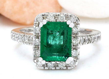 3.26 CTW Natural Emerald 18K Solid White Gold Diamond Ring: 3.26 CTW Natural Emerald 18K Solid White Gold Diamond Ring Manufacturer's Suggested Retail Price: $ 5400.00 3.26 Carat Natural Emerald 18K Solid White Gold Diamond Ring Item Type: Ring Item