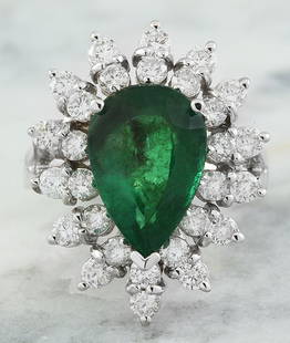 5.20 CTW Emerald 14K White Gold Diamond Ring: 5.20 CTW Emerald 14K White Gold Diamond Ring Manufacturer's Suggested Retail Price: $ 5400.00 Stamped: 14K Total Ring Weight: 7.8 Grams Emerald Weight 3.80 Carat (15.00x8.00 Millimeters)