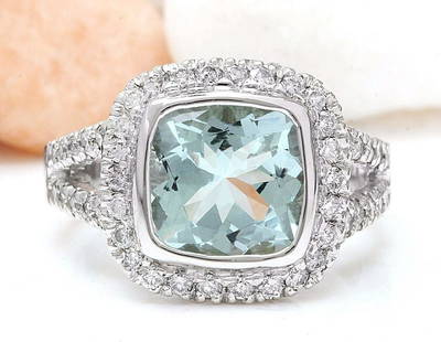 5.60 CTW Natural Aquamarine 18K Solid White Gold Diamond Ring: 5.60 CTW Natural Aquamarine 18K Solid White Gold Diamond Ring Manufacturer's Suggested Retail Price: $ 4400.00 5.60 Carat Natural Aquamarine 18K Solid White Gold Diamond Ring Item Type: Ring 