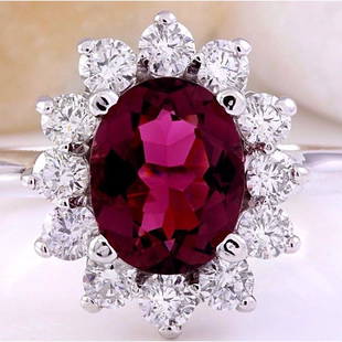 2.93 CTW Natural Tourmaline 14K Solid White Gold Diamond Ring: 2.93 CTW Natural Tourmaline 14K Solid White Gold Diamond Ring Manufacturer's Suggested Retail Price: $ 3100.00 2.93 Carat Natural Tourmaline 14K Solid White Gold Diamond Ring Item Type: Ring 