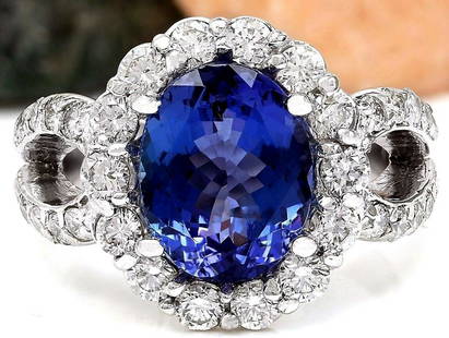 5.32 CTW Natural Tanzanite 14K Solid White Gold Diamond Ring: 5.32 CTW Natural Tanzanite 14K Solid White Gold Diamond Ring Manufacturer's Suggested Retail Price: $ 5900.00 5.32 Carat Natural Tanzanite 14K Solid White Gold Diamond Ring Item Type: Ring 