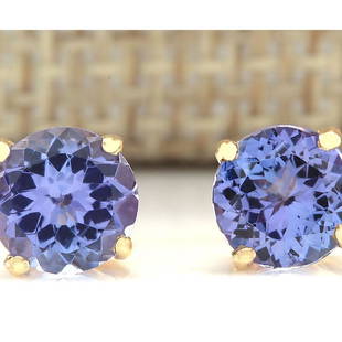 2.30 CTW Natural Blue Tanzanit Earrings 14k Solid Yellow Gold: 2.30 CTW Natural Blue Tanzanit Earrings 14k Solid Yellow Gold Manufacturer's Suggested Retail Price: $ 1900.00 Stamped: 14K Total Earring Weight: 1.2 Grams Gemstone Weight: Total