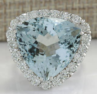15.92 CTW Natural Aquamarine And Diamond Ring In 18K Solid White Gold: 15.92 CTW Natural Aquamarine And Diamond Ring In 18K Solid White Gold Manufacturer's Suggested Retail Price: $ 7500.00 Stamped: 18K Ring Size: 6.75 Total Ring Weight: 10 Grams Diamond
