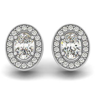 Natural 1.32 CTW Diamond Earrings 14K White Gold: Natural 1.32 CTW Diamond Earrings 14K White Gold Manufacturer's Suggested Retail Price: $ 7100.00 Product Type: Diamond Earrings Stone1 Type: 2 Diamond @ 1 CTW Stone1 Color: G Stone1 Clarity: