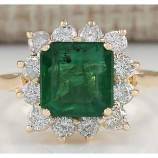 4.40 CTW Natural Emerald And Diamond Ring In 18K Yellow Gold: 4.40 CTW Natural Emerald And Diamond Ring In 18K Yellow Gold Manufacturer's Suggested Retail Price: $ 5800.00 Stamped: 18K Ring Size: 7 Total Ring Weight: 5 Grams Diamond Weight: Total