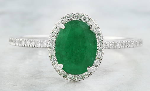 1.34 CTW Emerald 14K White Gold Diamond Ring: 1.34 CTW Emerald 14K White Gold Diamond Ring Manufacturer's Suggested Retail Price: $ 2100.00 Stamped: 14K Total Ring Weight: 1.6 Grams Emerald Weight 1.21 Carat (8.00x6.00 Millimeters)