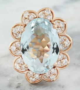 8.16 CTW Aquamarine 18K Rose Gold Diamond Ring: 8.16 CTW Aquamarine 18K Rose Gold Diamond Ring Manufacturer's Suggested Retail Price: $ 4900.00 Stamped: 18K Total Ring Weight: 7.6 Grams Aquamarine Weight 7.36 Carat (15.00x11.00 Millimeters)