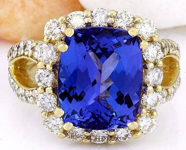 9.55 CTW Natural Tanzanite 18K Solid Yellow Gold Diamond Ring: 9.55 CTW Natural Tanzanite 18K Solid Yellow Gold Diamond Ring Manufacturer's Suggested Retail Price: $ 9500.00 9.55 Carat Natural Tanzanite 18K Solid Yellow Gold Diamond Ring Item Type: Ring 