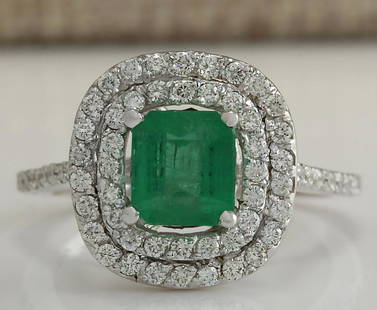 2.12 CTW Natural Colombian Emerald And Diamond Ring In 14K White Gold: 2.12 CTW Natural Colombian Emerald And Diamond Ring In 14K White Gold Manufacturer's Suggested Retail Price: $ 3500.00 Stamped: 14K Ring Size: 5.5 Total Ring Weight: 3.8 Grams Diamond