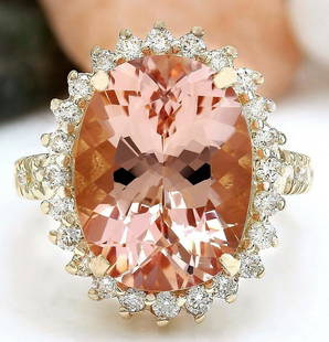 9.35 CTW Natural Morganite 18K Solid Yellow Gold Diamond Ring: 9.35 CTW Natural Morganite 18K Solid Yellow Gold Diamond Ring Manufacturer's Suggested Retail Price: $ 5400.00 9.35 Carat Natural Morganite 18K Solid Yellow Gold Diamond Ring Item Type: Ring 