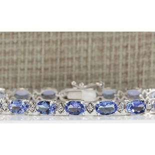 11.35 CTW Natural Tanzanite And Dimond Bracelet In 18K Solid White Gold: 11.35 CTW Natural Tanzanite And Dimond Bracelet In 18K Solid White Gold Manufacturer's Suggested Retail Price: $ 3600.00 Stamped: 18K Bracelet Width: 4.75mm Bracelet Length: 7.0 Inches 