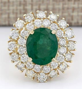 6.65 CTW Natural Emerald And Diamond Ring In 14k Yellow Gold: 6.65 CTW Natural Emerald And Diamond Ring In 14k Yellow Gold Manufacturer's Suggested Retail Price: $ 8400.00 Stamped: 14K Ring Size: 6.25 Total Ring Weight: 9 Grams Diamond Weight: Total