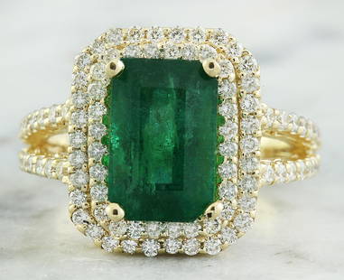 4.42 CTW Emerald 14K Yellow Gold Diamond Ring: 4.42 CTW Emerald 14K Yellow Gold Diamond Ring Manufacturer's Suggested Retail Price: $ 4700.00 Stamped: 14K Total Ring Weight: 7.1 Grams Emerald Weight: 3.42 Carat (11.10x7.30 Millimeters) 