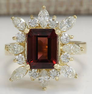 4.43 CTW Natural Red Tourmaline And Diamond Ring 14K Solid Yellow Gold: 4.43 CTW Natural Red Tourmaline And Diamond Ring 14K Solid Yellow Gold Manufacturer's Suggested Retail Price: $ 4800.00 Stamped: 14K Ring Size: 6 Total Ring Weight: 5.9 Grams Diamond Weight: