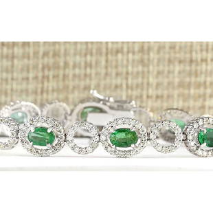 6.98 CTW Natural Emerald And Diamond Bracelet In 18K White Gold: 6.98 CTW Natural Emerald And Diamond Bracelet In 18K White Gold Manufacturer's Suggested Retail Price: $ 9000.00 Stamped: 18K Bracelet Width: 8.73mm Bracelet Length: 7.0 Inches Total