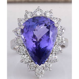 10.06 CTW Natural Blue Tanzanite And Diamond Ring In 14K White Gold: 10.06 CTW Natural Blue Tanzanite And Diamond Ring In 14K White Gold Manufacturer's Suggested Retail Price: $ 8700.00 Stamped: 14K Ring Size: 6.75 Total Ring Weight: 7 Grams Diamond Weight: 