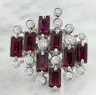 3.30 CTW Ruby 14K White Gold Diamond Ring: 3.30 CTW Ruby 14K White Gold Diamond Ring Manufacturer's Suggested Retail Price: $ 3600.00 Stamped: 14K Total Ring Weight: 6.8 Grams Ruby Weight 2.85 Carat (4.40x2.50 Millimeters) Diamond