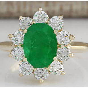 3.08 CTW Natural Emerald And Diamond Ring 18K Solid Yellow Gold: 3.08 CTW Natural Emerald And Diamond Ring 18K Solid Yellow Gold Manufacturer's Suggested Retail Price: $ 5000.00 Stamped: 18K Ring Size: 6.5 Total Ring Weight: 4.5 Grams Diamond Weight: 