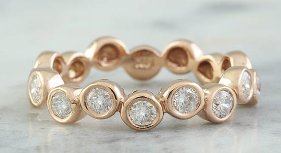 0.55 CTW 18K Rose Gold Diamond Ring: 0.55 CTW 18K Rose Gold Diamond Ring Manufacturer's Suggested Retail Price: $ 2400.00 Stamped: 18K Ring Size: 7 Total Ring Weight: 3 Grams Diamond Weight: 0.55 Carat (F-G Color, VS2-SI1