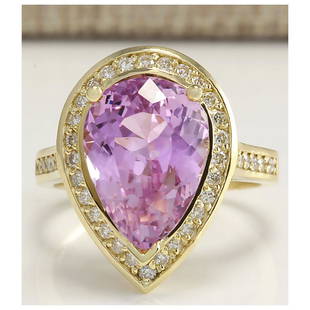 8.71 CTW Natural Pink Kunzite And Diamond Ring In 18K Yellow Gold: 8.71 CTW Natural Pink Kunzite And Diamond Ring In 18K Yellow Gold Manufacturer's Suggested Retail Price: $ 3700.00 Stamped: 18K Ring Size: 7.25 Total Ring Weight: 7.8 Grams Diamond Weight: 