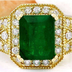 4.35 CTW Natural Emerald 14K Solid Yellow Gold Diamond Ring: 4.35 CTW Natural Emerald 14K Solid Yellow Gold Diamond Ring Manufacturer's Suggested Retail Price: $ 4800.00 4.35 Carat Natural Emerald 14K Solid Yellow Gold Diamond Ring Item Type: Ring 