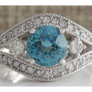 4.16 CTW Natural Blue Zircon And Diamond Ring 14K Solid White Gold: 4.16 CTW Natural Blue Zircon And Diamond Ring 14K Solid White Gold Manufacturer's Suggested Retail Price: $ 3000.00 Stamped: 14K Ring Size: 7.25 Total Ring Weight: 5.5 Grams Diamond Weight: 