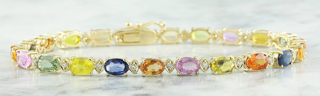 13.57 CTW Sapphire 14K Yellow Gold Diamond Ring: 13.57 CTW Sapphire 14K Yellow Gold Diamond Ring Manufacturer's Suggested Retail Price: $ 4300.00 Stamped: 14K Total Bracelet Weight: 9 Grams Bracelet Length: 7.5 Inches Sapphire Weight: 13.02