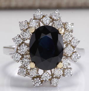4.83 CTW Natural Blue Sapphire Diamond Ring 14K Solid White Gold: 4.83 CTW Natural Blue Sapphire Diamond Ring 14K Solid White Gold Manufacturer's Suggested Retail Price: $ 5200.00 Stamped: 14K Ring Size: 7.75 Total Ring Weight: 7.5 Grams Diamond Weight: 