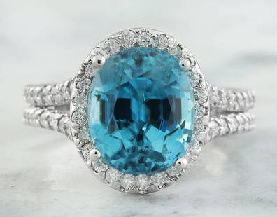8.70 CTW Zircon 14K White Gold Diamond Ring: 8.70 CTW Zircon 14K White Gold Diamond Ring Manufacturer's Suggested Retail Price: $ 4500.00 Stamped: 14K Ring Size: 7 Total Ring Weight: 6.4 Grams Zircon Weight: 7.90 Carat (10.60x8.85