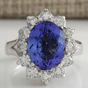 5.03 CTW Natural Tanzanite Diamond Ring 14K Solid White Gold: 5.03 CTW Natural Tanzanite Diamond Ring 14K Solid White Gold Manufacturer's Suggested Retail Price: $ 6400.00 Stamped: 14K Ring Size: 6.25 Total Ring Weight: 7.6 Grams Diamond Weight: 