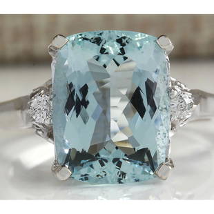 4.60 CTW Natural Aquamarine And Diamond Ring In 18K Solid White Gold: 4.60 CTW Natural Aquamarine And Diamond Ring In 18K Solid White Gold Manufacturer's Suggested Retail Price: $ 2800.00 Stamped: 18K Ring Size: 6.75 Total Ring Weight: 4 Grams Diamond Weight: 