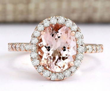 2.67 CTW Natural Morganite And Diamond Ring In 18K Rose Gold: 2.67 CTW Natural Morganite And Diamond Ring In 18K Rose Gold Manufacturer's Suggested Retail Price: $ 3500.00 Stamped: 18K Ring Size: 7 Total Ring Weight: 3.7 Grams Diamond Weight: Total