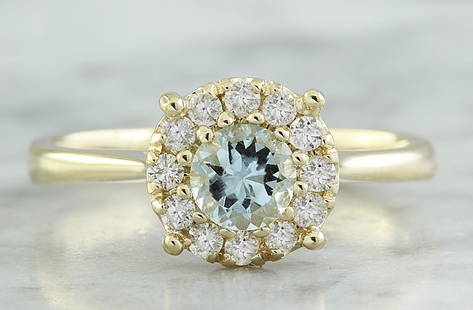 0.72 CTW Aquamarine 18K Yellow Gold Diamond Ring: 0.72 CTW Aquamarine 18K Yellow Gold Diamond Ring Manufacturer's Suggested Retail Price: $ 1800.00 Stamped: 18K Total Ring Weight: 2.9 Grams Aquamarine Weight: 0.50 Carat (5.50x5.50