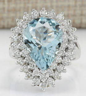 5.90 CTW Natural Aquamarine And Diamond Ring In 14K White Gold: 5.90 CTW Natural Aquamarine And Diamond Ring In 14K White Gold Manufacturer's Suggested Retail Price: $ 5200.00 Stamped: 14K Ring Size: 6.25 Total Ring Weight: 7.5 Grams Diamond Weight: 