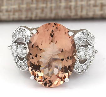 8.58 CTW Natural Morganite And Diamond Ring In 14k White Gold: 8.58 CTW Natural Morganite And Diamond Ring In 14k White Gold Manufacturer's Suggested Retail Price: $ 4700.00 Stamped: 14K Ring Size: 7 Total Ring Weight: 9.6 Grams Diamond Weight: Total