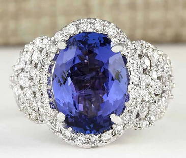 7.60 CTW Natural Blue Tanzanite And Diamond Ring 18K Solid White Gold: 7.60 CTW Natural Blue Tanzanite And Diamond Ring 18K Solid White Gold Manufacturer's Suggested Retail Price: $ 8500.00 Stamped: 18K Ring Size: 7.5 Total Ring Weight: 10.4 Grams Diamond