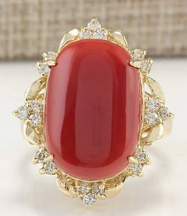 12.38CTW Natural Coral And Diamond Ring In 14K Yellow Gold: 12.38CTW Natural Coral And Diamond Ring In 14K Yellow Gold Manufacturer's Suggested Retail Price: $ 4700.00 Stamped: 14K Ring Size: 7.25 Total Ring Weight: 8 Grams Diamond Weight: Total