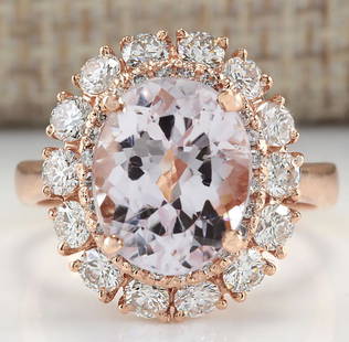 5.66 CTW Natural Morganite And Diamond Ring 14K Solid Rose Gold: 5.66 CTW Natural Morganite And Diamond Ring 14K Solid Rose Gold Manufacturer's Suggested Retail Price: $ 4900.00 Stamped: 14K Ring Size: 6 Total Ring Weight: 5.2 Grams Diamond Weight: 