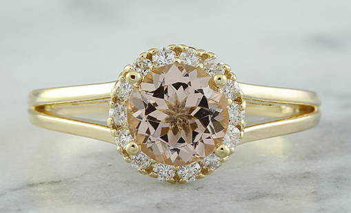 1.24 CTW Morganite 18K Yellow Gold Diamond Ring: 1.24 CTW Morganite 18K Yellow Gold Diamond Ring Manufacturer's Suggested Retail Price: $ 2200.00 Stamped: 18K Ring Size: 7 Total Ring Weight: 2.8 Grams Morganite Weight: 1.00 Carat (6.80x6.80