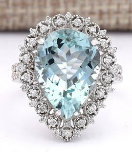 7.81 CTW Natural Aquamarine And Diamond Ring In 14k White Gold: 7.81 CTW Natural Aquamarine And Diamond Ring In 14k White Gold Manufacturer's Suggested Retail Price: $ 4000.00 Stamped: 14K Ring Size: 7 Total Ring Weight: 7.2 Grams Diamond Weight: 